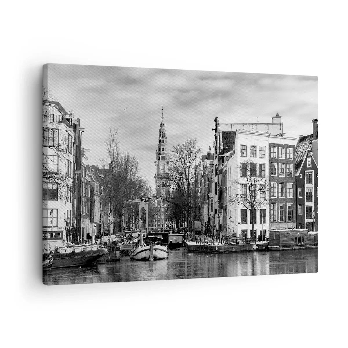 Lærredstryk - Billede på lærred - Sort-hvid panorama af Amsterdam med kanal og historiske bygninger - 70x50cm - Amsterdam stemning - Moderne vægdekoration til stue og soveværelse ARTTOR