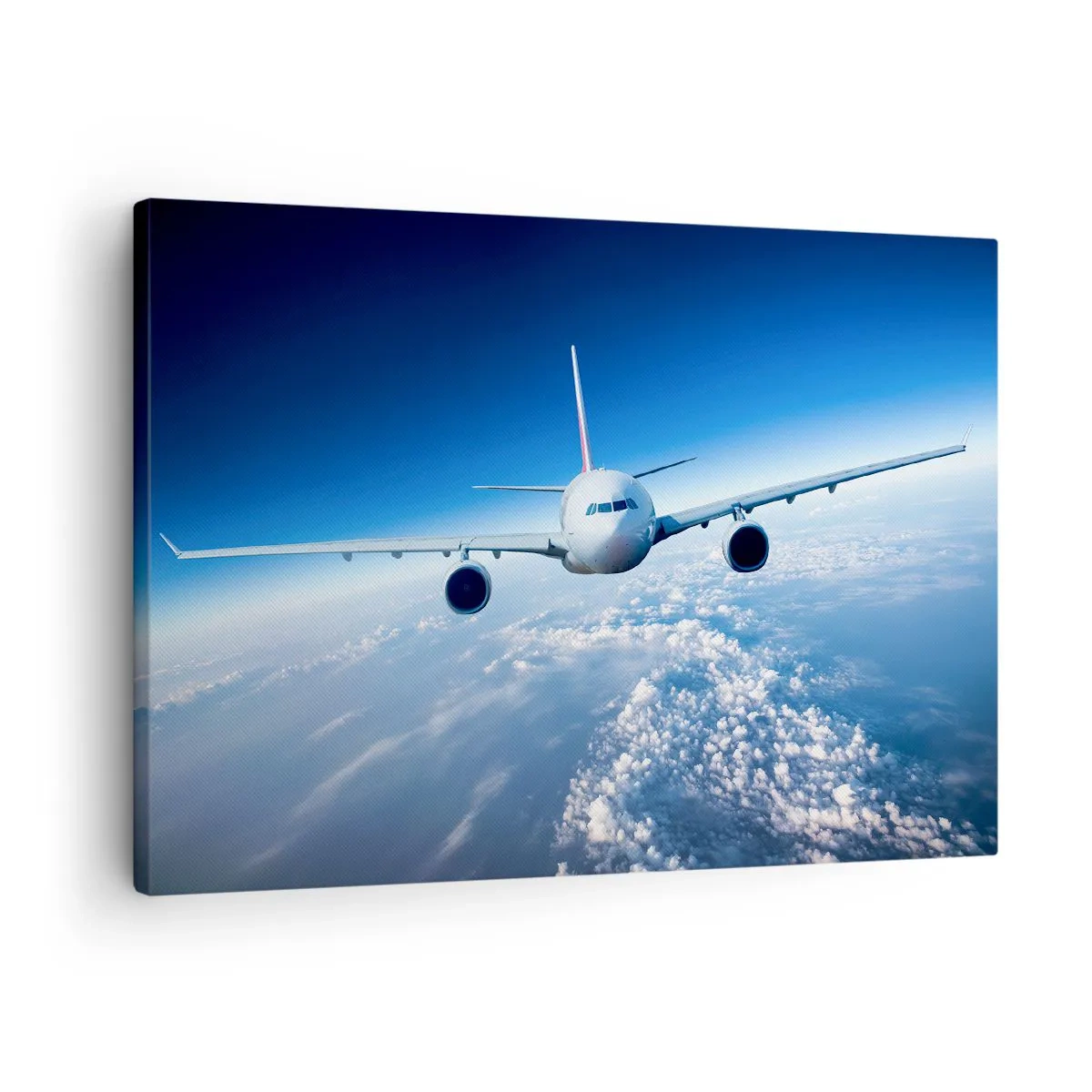 Lærredstryk - Billede på lærred - Et fly, der flyver over skyerne mod en blå himmel - 70x50cm - Jeg går, fordi jeg vil - Moderne vægdekoration til stue og soveværelse ARTTOR