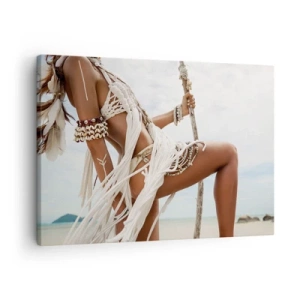 Lærredstryk - Billede på lærred - En kvindefigur i etniske ornamenter og tøj mod en baggrund af et tropisk landskab. - 70x50cm - Præstinde af solen - Moderne vægdekoration til stue og soveværelse ARTTOR