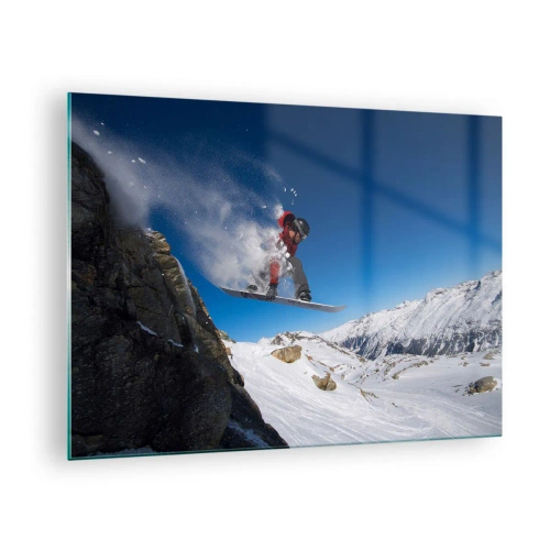 Billede på glas - En snowboarder hopper mod en bjergkulisse - 70x50cm - Og du er blevet en del af rummet - Moderne vægdekoration til stue og soveværelse ARTTOR