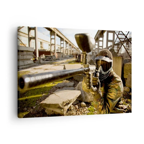 Lærredstryk - Billede på lærred - En paintballspiller i camouflageudstyr sigter mod en markør - 70x50cm - Og du kan blive en helt - Moderne vægdekoration til stue og soveværelse ARTTOR