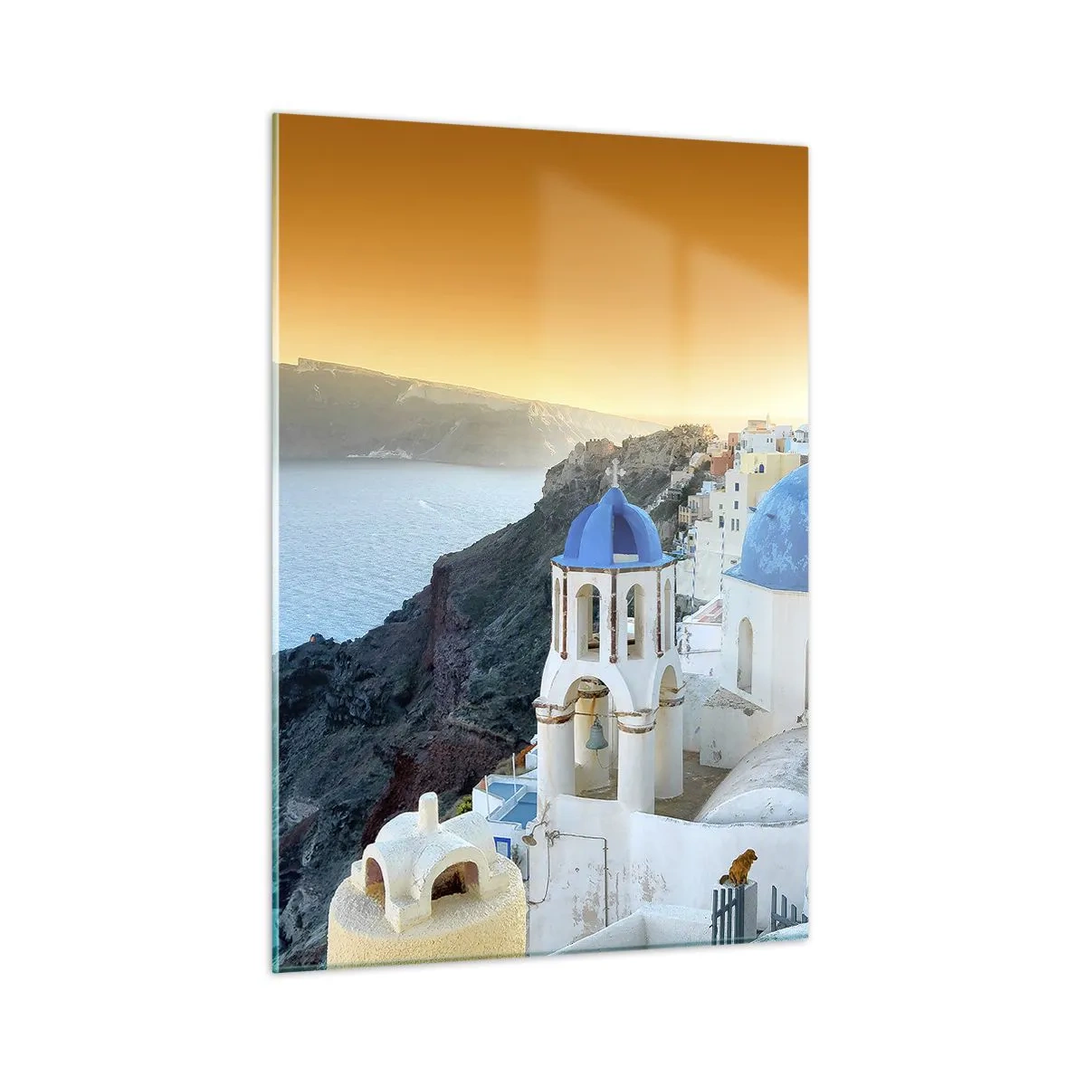 Billede på glas - Santorini - omfavnet af klipperne - 50x70 cm